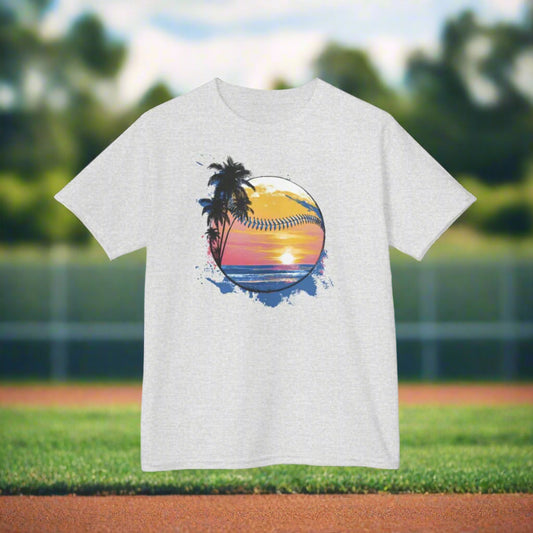 Gray t-shirt with a tropical graphic design featuring palm trees and a sunset on a white background